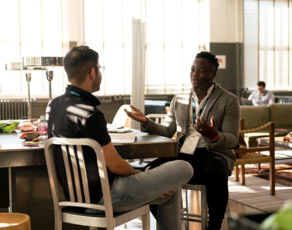 Two men meeting in person