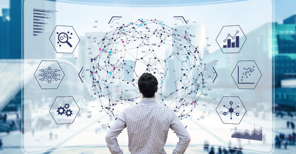 man looking at screen with data