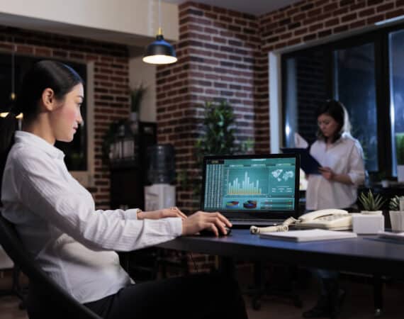 Woman Examining Data Trends That Will Dominate 2023