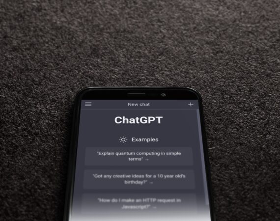 A smartphone displaying ChatGPT AI against a black background.
